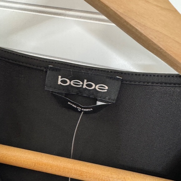 NEW bebe Asymmetrical U Ring Knit Top Small - Picture 2 of 8